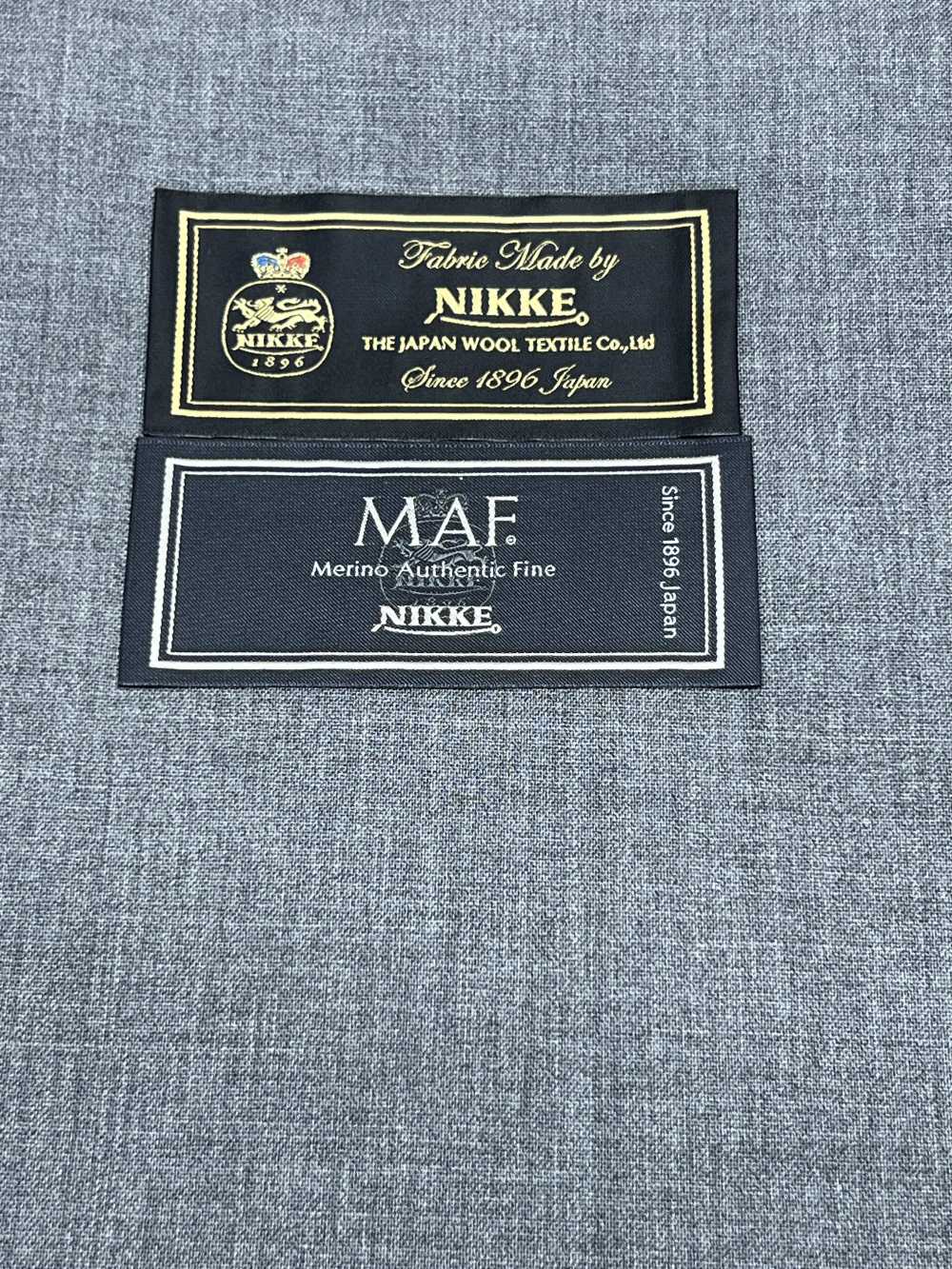 896S2001-014 NIKKE MAF Gris Claro Sin Patrón[Textil] Níquel