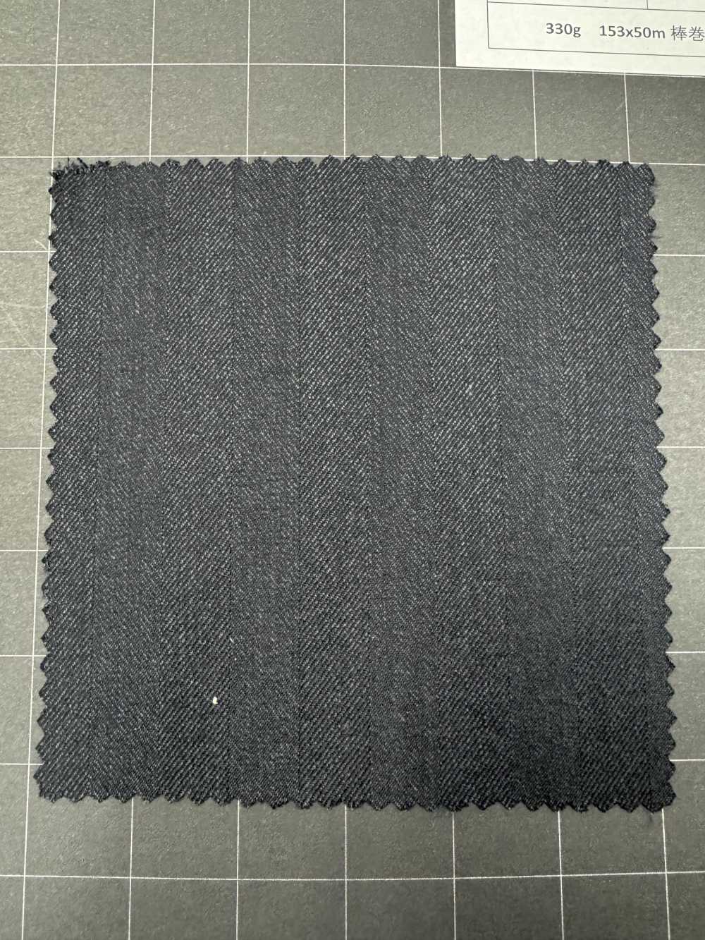 EBFW34-18 [Existencias Limitadas] Tela Nikke Textile MAFsuper120's De Espiga Gris Oscuro NIKKE